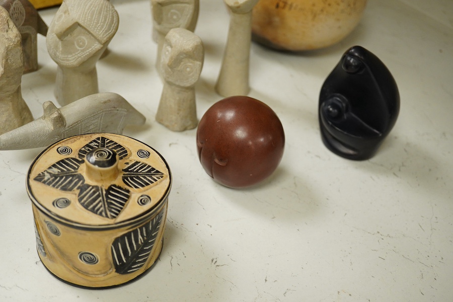A quantity of African stone carvings together with a similar carved gourd vase, largest 28cm wide. Condition - fair/good